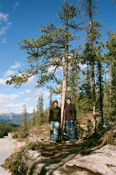 Two students by a tree